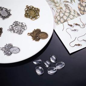 img 2 attached to 💎 PH PandaHall 36pcs 3 Style Earring Pendant Tray Bezel Cabochon Settings, 40pcs Oval Transparent Glass Cabochons and 40pcs Brass Earring Hooks (Antique Silver & Bronze): Enhance Your Jewelry Making with this All-in-One Kit