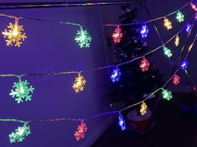 img 2 attached to 🎄 Darknessbreak Solar Christmas Lights: 30ft 50 LED Multi-Color Snowflake String Lights for Outdoor Xmas Decor, Tree, Fire Place, Play House, Kids Tent, Bedroom