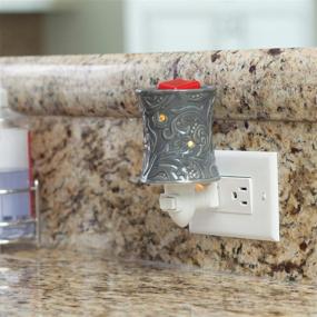 img 1 attached to Candle Warmers Etc. Pluggable Fragrance Warmer, Rainstorm: Indulge in Rainstorm's Invigorating Aromas!