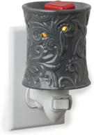 candle warmers etc. pluggable fragrance warmer, rainstorm: indulge in rainstorm's invigorating aromas! logo