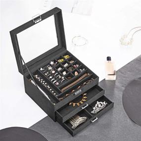 img 2 attached to 📿 SONGMICS Gray Velvet Jewelry Box with 3 Tiers, Clear Glass Lid, Multiple Compartments for Necklaces, Bracelets, Rings, Lock and Key - UJBC158G01