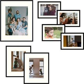 img 4 attached to Frametory 7-Piece Aluminum Wall Frame Set with Ivory Mat - 4x 5x7, 2x 8x10, 1x 11x14 - Real Glass, Swivel Tabs, Sawtooth Hangers - Black