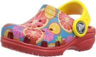 👦 crocs classic graphic multi toddler boys' shoes: stylish clogs & mules for little feet! logo