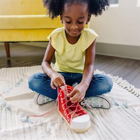 img 1 attached to 👟 Melissa &amp; Doug Deluxe Wooden Lacing Sneaker – Fun and Educational Shoe Tying Toy