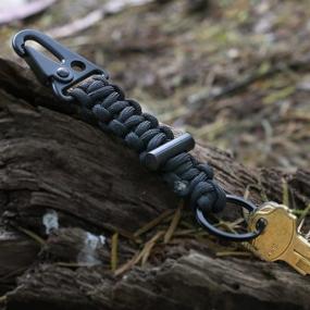 img 2 attached to 🔐 Premium Quality Black Paracord Carabiner Survival Keychain Lanyard - Military Grade Type III 7 Strand 550 Lb Test Cord - Top-Rated Outdoor Gear by Bomber and Company