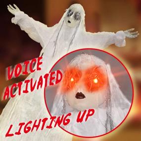 img 1 attached to 👻 Halloween Hanging Ghost Decorations - 60 Inch Animated Skeleton with Red Glowing Eyes and Voice Activation, Scary Props for Window Wall, Outdoor Indoor Yard, Patio House Decor - YOPINSAND