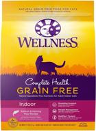 🐱 wellness complete health grain-free dry cat food, indoor adult formula with salmon and herring meal, made in the usa, natural, enriched with vitamins and minerals logo