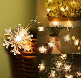 img 1 attached to 🎄 Merdeco Snowflake String Lights - 16ft/5m 50 LED Warm White Fairy Lights for Christmas, Wedding, Party - Indoor & Outdoor Decor