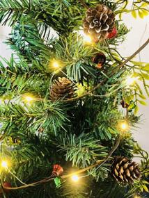 img 2 attached to 🎄 Festive 6.5FT Christmas Garland with Lights & Pine Cones - 30 LED Battery Powered Garland Lights with Red Berries, Pine Needles, and Red Bells - Perfect Xmas Tree Decorations for Holiday Party