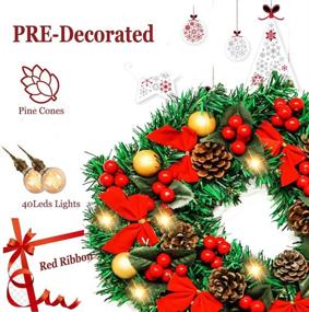 img 3 attached to 🎄 Привлекательный 16-дюймовый рождественский венок для входной двери с подсветкой - Искусственный ёлочный венок с металлическим крюком, 40 батарейными светодиодными огнями, шишками, красными ягодами, бантами - Реалистичный и захватывающий