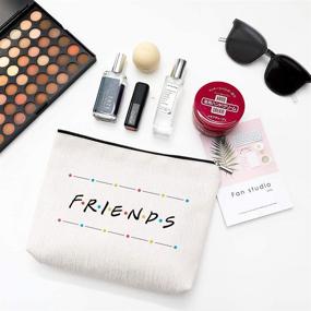 img 1 attached to 👭 Friends Forever [25th Anniversary Edition] Official Friends TV Show Merchandise: Yellow Peephole Frame Cosmetic Bag for Friends Fans