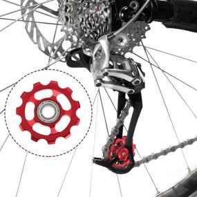 img 1 attached to 💛 High-Quality 11T Aluminum Sealed Bearing Jockey Wheel Bicycle Guide Roller Rear Derailleur Pulley in Striking Red and Yellow Shades