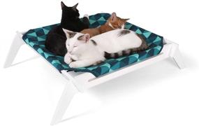 img 4 attached to Premium Pet Lounge by Primetime Petz - Raised Indoor Bed for Cats or Small Dogs with Reversible Fabric Hammock (Blue Triangles/Solid Teal)