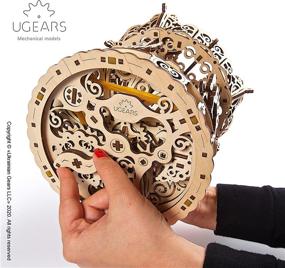 img 1 attached to 🎠 Upgrade your searchability with the UGEARS Mechanical Self Assembling Wooden Carousel