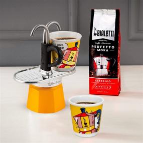 img 1 attached to Набор для кофе Bialetti Mini Express Lichtenstein Moka с кофеваркой ☕ на 2 чашки (2.8 унций) + 2 шот-стакана, желтый, алюминий