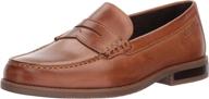 classy & timeless: rockport curtys penny loafer cognac - elevate your style logo