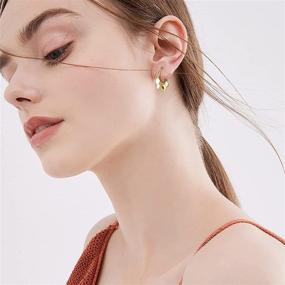 img 2 attached to 👂 UHIBROS Gold Huggie Hoop Earrings: 14K Gold Plated Dainty Tassel Dangle Earrings for Women