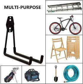 img 1 attached to 🔧 Ultimate Garage Organization: 4 Pack Wall Mount Storage Hanger with Extension Cord Holder - Heavy-Duty Hooks for Ladder, Ski, Sports, Utility, Garden Tool, Hose Storage Rack Organizer