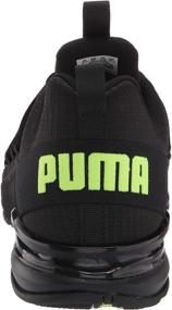 img 2 attached to PUMA Axelion Sneaker Black Yellow Alert