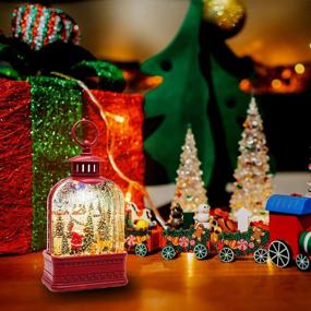 img 3 attached to 🎅 Melunar Christmas Snow Globe Lantern: Santa Claus Glittering Lamp, Festive Home Decorations & Gift