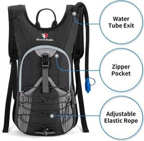 img 1 attached to 🎒 ROCKRAIN Hydration Backpack: Stay Hydrated on Outdoor Adventures with Insulated 2L Water Bladder - Ideal for Hiking, Running, Climbing, and Cycling - Perfect for Men, Women, Kids - Lightweight Daypack