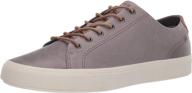 sperry men's striper plushwave sneaker: ultimate comfort and style in men's shoes logo