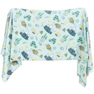 experience ultimate comfort with village baby's extra soft knit swaddling receiving blanket for outdoor adventure logo