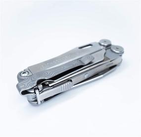 img 1 attached to 🔧 Innovative Donk! Titanium TC4 Pocket Clip for Leatherman Wave, Wave+ & Surge - Quick Release, 6 Custom Designs & Extra Carry Options – 'Norwegian Wood'