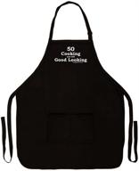 🎉 still looking good at 50! funny kitchen apron with 50th birthday theme, two pockets, and black color логотип