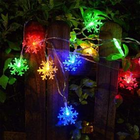 img 1 attached to 🎄 Homeleo 30ft Solar Christmas Snowflake Lights with 50 LEDs, Outdoor Multi-Color Snowflake Lights String for Xmas Backyard Garden Patio Decorations