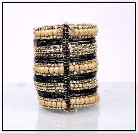 img 3 attached to Exquisite Tribal Chic Black Bead and Metal Spiral Cuff/Bracelets for Girls and Women: Dazzling Fashion Accessory