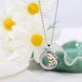 img 3 attached to HUHUA Mom's Love Necklace - Round-shaped Necklace Jewelry with Mom Hugging Kid Pattern. Ideal Gifts for Grandmother, Mom, Daughter, and Wife