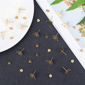 img 1 attached to 100pcs Flat Round Golden Stainless Steel Earring Pins - Stud Earring Posts with Loop, 10mm Flat Pad - DIY Earring Components for Making Findings - 1.5mm Hole, 0.8mm Pin