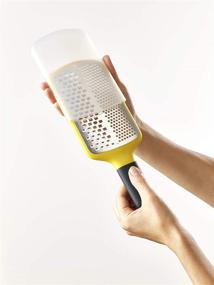 img 2 attached to 🧀 Yellow Compact Paddle Grater by Joseph Joseph - Multi-Grate with Coarse and Fine Blades, Non-Slip Handle, Dishwasher Safe - One-size