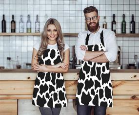 img 3 attached to 🐄 WONDERTIFY Black and White Cow Pattern Apron: Stylish Cowhide Design with Adjustable Neck for Men and Women in Home Kitchen, Cooking, Waitressing, Cheffing, Grilling, Baking, BBQing, and Cobbler Work