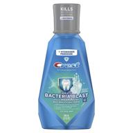 crest breath bacteria blast mouthwash, refreshing icy cool mint formula, 32 fluid ounces logo