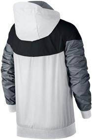 img 3 attached to Stylish NIKE Sportswear Windrunner Jacket in White - Perfect for Boys' Clothing!