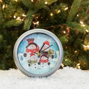 img 3 attached to Winter Wonderland Round Silvertone Framed 8 Inch Musical Christmas Wall Clock - Snowman Family