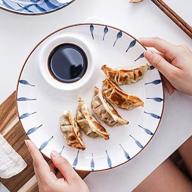 ceramic japanese dumpling serving tray logo