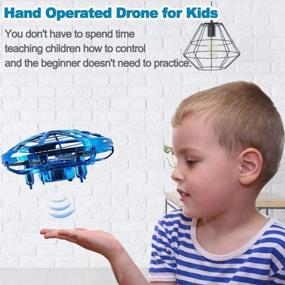 img 3 attached to 🚁 TURNMEON Hand Operated Mini Drone RC Drone Toys for 8-14 Year Old Boys Girls, 2 Speed Auto-Avoid Obstacles 360°Rotating Helicopter Flying Ball Toys for Kids - Ideal Christmas Holiday Gifts for Outdoor Indoor Game