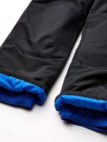 img 1 attached to Top-Rated Amazon Essentials Boys' Water-Resistant Snow Pants: Must-Have Winter Gear!