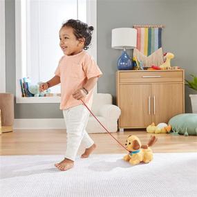 img 1 attached to 🐶 Fisher-Price Lil' Snoopy: Занимательная игрушка на ремне с собачьей тематикой для ползающих детей и малышей
