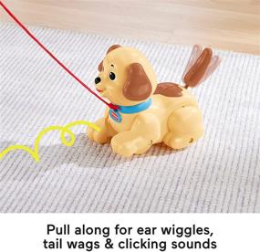 img 2 attached to 🐶 Fisher-Price Lil' Snoopy: Занимательная игрушка на ремне с собачьей тематикой для ползающих детей и малышей