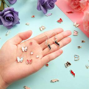 img 2 attached to 🦋✨ 150 Piece Colorful Enamel Alloy Pendant Charms: Butterfly, Star & Flash Shape Charms for DIY Jewelry Making Crafts