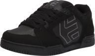 etnies puffy skate shoe in black dirty logo