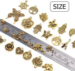 img 1 attached to Wholesale Charms and Pendants: 100g Assorted Charms and Beads for Jewelry Making - Antique Gold