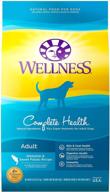 wellness complete health dry dog food with whitefish & [specific beneficial ingredient]. logo