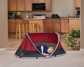 img 1 attached to KidCo P3041ZL Peapod Portable Travel Bed - Indoor/Outdoor Tangerine