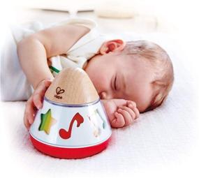 img 3 attached to 🎵 Hape E0332 Rotating Baby Music Box: Spin & Play Music, No Battery Required, 40 x 40 cm, Multicolor - Best Deals!