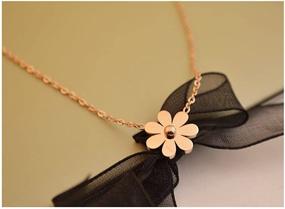 img 3 attached to 🌼 Stylish Vintage Daisy Flower Pendant Necklace for Women and Girls - KESTYLE Stainless Steel Fashion Accessory